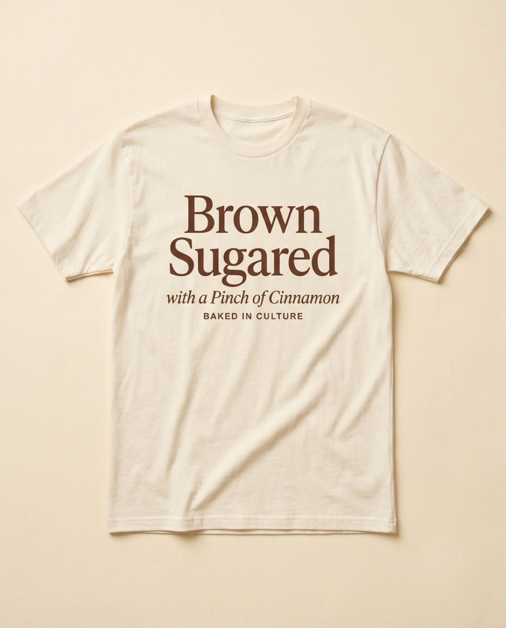 Brown Sugared with a Pinch of Cinnamon t-shirt — print reads Baked in Culture